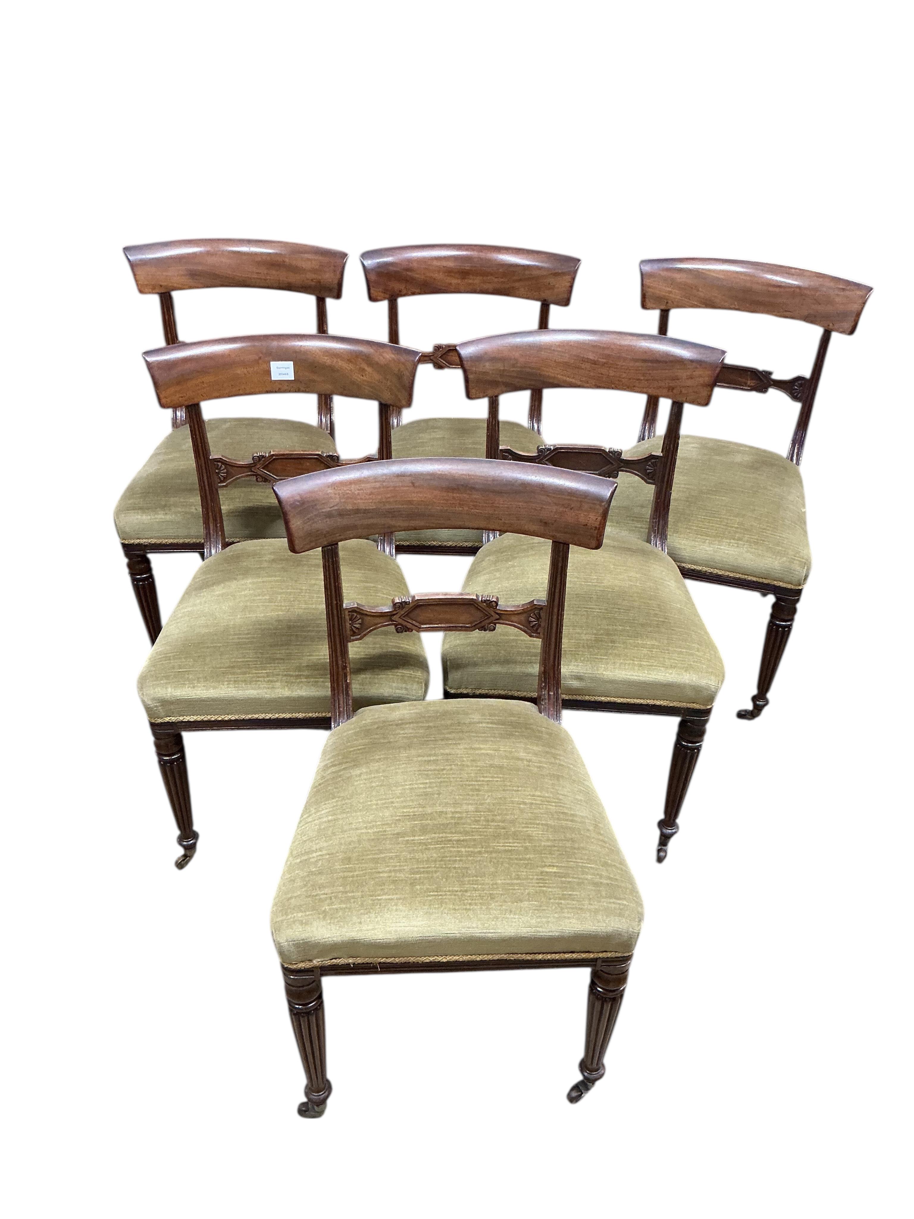 A set of six Regency mahogany bar back dining chairs on fluted legs